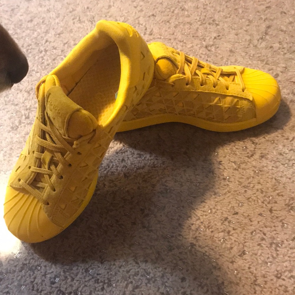 Yellow adidas superstar suede